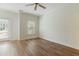 Bright bedroom with a window and a glass patio door out to the deck at 1565 Briergate Dr, Duluth, GA 30097
