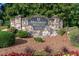 Community entrance sign for Stonebrier at Sugarloaf surrounded by colorful landscaping at 1565 Briergate Dr, Duluth, GA 30097