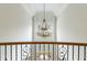 Bright, two-story foyer featuring a decorative chandelier at 1565 Briergate Dr, Duluth, GA 30097