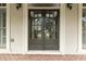 Elegant double front doors with glass panels and brick flooring at 1565 Briergate Dr, Duluth, GA 30097