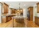 Beautiful kitchen with granite countertops, hardwood floors, and modern appliances at 1565 Briergate Dr, Duluth, GA 30097