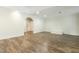 Spacious living room showcasing wood flooring, recessed lighting, and elegant trim work at 1565 Briergate Dr, Duluth, GA 30097