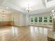 Spacious living area boasts hardwood floors, a fireplace, and a window seat at 1565 Briergate Dr, Duluth, GA 30097