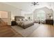 Bright main bedroom with sitting area, vaulted ceilings and large windows that provide an abundance of light at 1565 Briergate Dr, Duluth, GA 30097