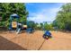 Community playground with swings, slide, and climbing area for children to enjoy at 1565 Briergate Dr, Duluth, GA 30097