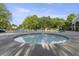 Community pool area featuring a kiddie pool with seating, lounge chairs, and umbrellas at 1565 Briergate Dr, Duluth, GA 30097