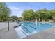 Beautiful community pool with lane markers and lounge chairs for residents at 1565 Briergate Dr, Duluth, GA 30097