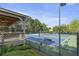 View of the Stonebrier at Sugarloaf tennis courts and covered outdoor bar at 1565 Briergate Dr, Duluth, GA 30097