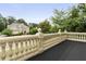 Balcony with a beautiful view of a landscaped home in a leafy neighborhood at 1565 Briergate Dr, Duluth, GA 30097