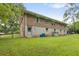 Expansive backyard featuring a fenced yard, lush lawn and mature trees for added privacy at 2720 Birchwood Sw Way, Marietta, GA 30060