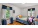 Bedroom with natural lighting and a warm ambiance at 2720 Birchwood Sw Way, Marietta, GA 30060