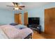 Comfortable bedroom with hardwood floors, large windows, and ample closet space at 2720 Birchwood Sw Way, Marietta, GA 30060