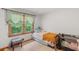 Bright bedroom featuring a sunlit window and comfortable furnishings at 2720 Birchwood Sw Way, Marietta, GA 30060