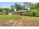 Charming brick home with a two-car garage and a well-manicured lawn at 2720 Birchwood Sw Way, Marietta, GA 30060