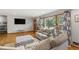 Cozy living room with large window offers plenty of natural light and street view at 2720 Birchwood Sw Way, Marietta, GA 30060
