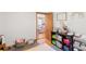 Bright playroom with open doorway to a cozy living room at 2720 Birchwood Sw Way, Marietta, GA 30060