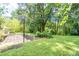 Backyard features a paved patio with a basketball hoop at 3467 Pinehill Dr, Decatur, GA 30032