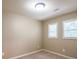 This is a standard bedroom with neutral paint, and two windows at 3467 Pinehill Dr, Decatur, GA 30032