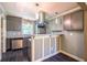 Updated kitchen with stainless steel appliances, granite countertops, and tiled backsplash at 3467 Pinehill Dr, Decatur, GA 30032