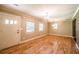Inviting living room with hardwood floors, freshly painted and with plenty of natural light at 3467 Pinehill Dr, Decatur, GA 30032