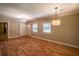 Spacious living room featuring hardwood floors and neutral paint, ready for personal touches at 3467 Pinehill Dr, Decatur, GA 30032