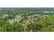 Overhead view of the neighborhood with mature trees lining the winding streets and sidewalks at 4178 Mcever Park Dr, Acworth, GA 30101