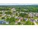 Aerial view of the neighborhood, showcasing mature tree coverage and various home styles at 4178 Mcever Park Dr, Acworth, GA 30101