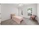Bedroom featuring two windows with blinds and a twin bed at 4178 Mcever Park Dr, Acworth, GA 30101