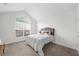 Bedroom featuring a window with blinds, carpet, and a queen bed at 4178 Mcever Park Dr, Acworth, GA 30101