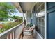 Inviting front porch with seating area, perfect for relaxing outdoors at 4178 Mcever Park Dr, Acworth, GA 30101