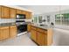 Well-equipped kitchen featuring granite countertops, stainless steel appliances, and a functional center island at 4178 Mcever Park Dr, Acworth, GA 30101