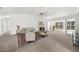 Open-concept living room with fireplace, large windows, and comfortable seating at 4178 Mcever Park Dr, Acworth, GA 30101