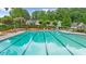 Large swimming pool at McEver Park features lounge chairs and umbrellas at 4178 Mcever Park Dr, Acworth, GA 30101