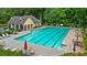 Community pool area featuring lounge chairs and shade at 4178 Mcever Park Dr, Acworth, GA 30101