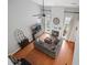Elevated view of a living room with a vaulted ceiling, fireplace, and hardwood flooring at 4312 Shillham Ct, Cumming, GA 30040