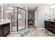 Beautiful bathroom featuring a glass enclosed shower and elegant vanity, creating a serene and stylish retreat at 5070 Laurel Ridge Dr, Cumming, GA 30040