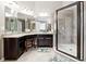 Modern bathroom featuring a vanity area and glass-enclosed shower, designed for comfort and style at 5070 Laurel Ridge Dr, Cumming, GA 30040