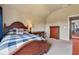 Comfortable bedroom with warm light, desk, and charming decor, designed for relaxation and productivity at 5070 Laurel Ridge Dr, Cumming, GA 30040