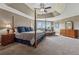 Large main bedroom with a trey ceiling, sitting area, and lots of natural light at 5070 Laurel Ridge Dr, Cumming, GA 30040