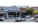 Bustling city street with diverse shops, pedestrian crossings, and a vibrant urban scene at 507 Regency Trl, Acworth, GA 30102