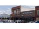Downtown district showcasing storefronts with schools, apparel shops, and a variety of commercial offerings at 507 Regency Trl, Acworth, GA 30102