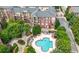 Aerial view of the condo complex showcasing the clover-shaped pool and landscaped grounds at 1735 Peachtree Ne St # 316, Atlanta, GA 30309