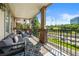 A furnished balcony with a view of trees and traffic at 1735 Peachtree Ne St # 316, Atlanta, GA 30309