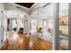 Spacious living room features hardwood flooring, columns, modern furniture and art at 1735 Peachtree Ne St # 316, Atlanta, GA 30309