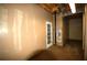 Unfinished basement featuring a door and exposed ceiling at 188 Thornbrooke Dr, Hiram, GA 30141