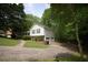 Home featuring a well maintained yard and long driveway, with an attached garage at 188 Thornbrooke Dr, Hiram, GA 30141