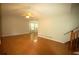 Bright living room featuring a large window, hardwood floors, and a ceiling fan at 188 Thornbrooke Dr, Hiram, GA 30141