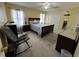 Comfortable main bedroom featuring natural light and spacious layout, providing relaxation and style at 2529 Feathertree Ln, Lawrenceville, GA 30044