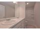 Bright bathroom features a double sink vanity and a separate tub and shower at 488 Charleston Pl, Villa Rica, GA 30180