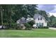 Charming home with well-maintained lawn and mature landscaping at 9707 Squirrel Wood Run, Douglasville, GA 30135